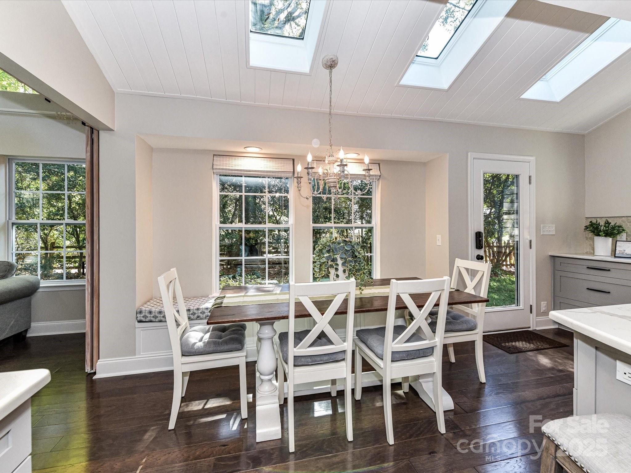 129 Shorecrest Drive Davidson, NC 28036 - Photo 15 of 45 a view of a dining room with furniture window and wooden floor