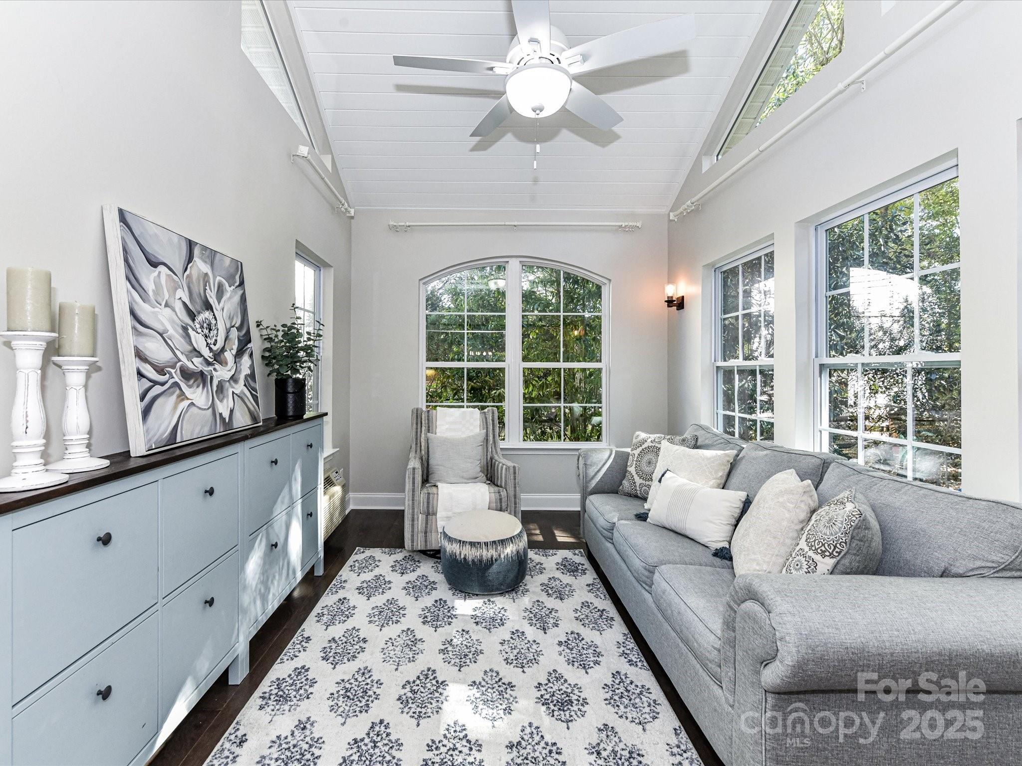 129 Shorecrest Drive Davidson, NC 28036 - Photo 17 of 45 a living room with furniture and large windows
