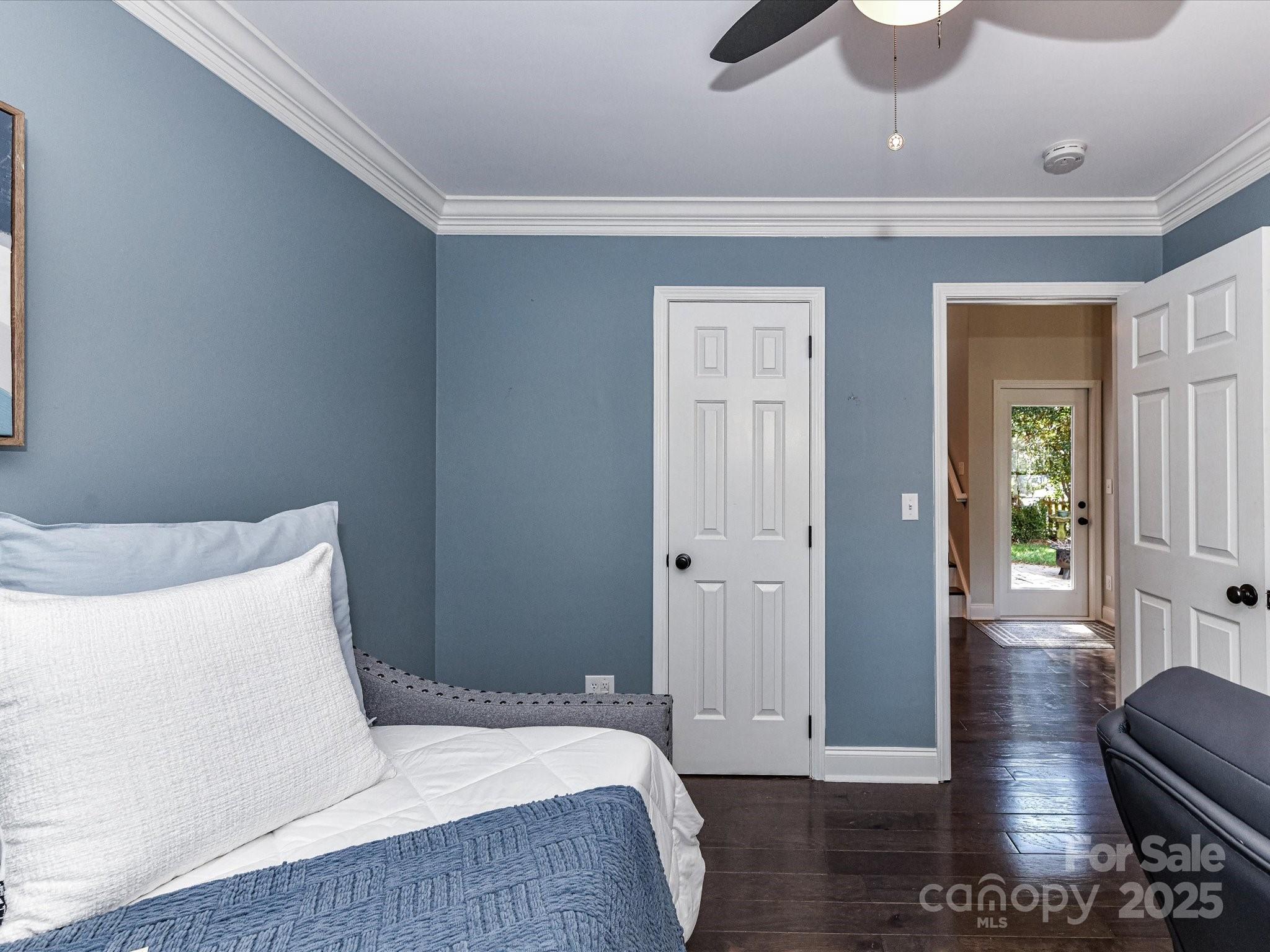 129 Shorecrest Drive Davidson, NC 28036 - Photo 20 of 45 a bedroom with a bed and wooden floor
