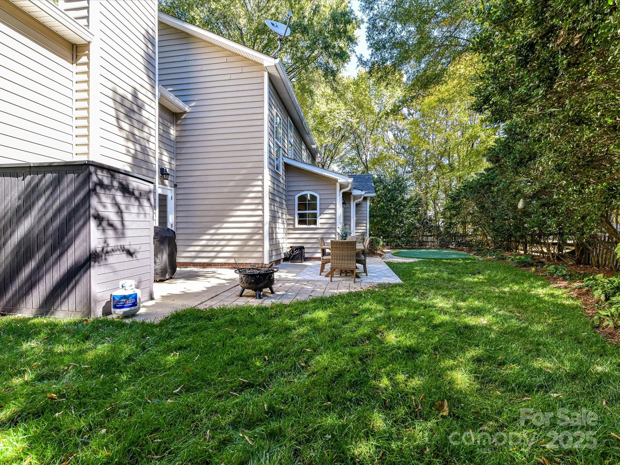 129 Shorecrest Drive Davidson, NC 28036 - Photo 35 of 45 a view of a house with backyard and sitting area