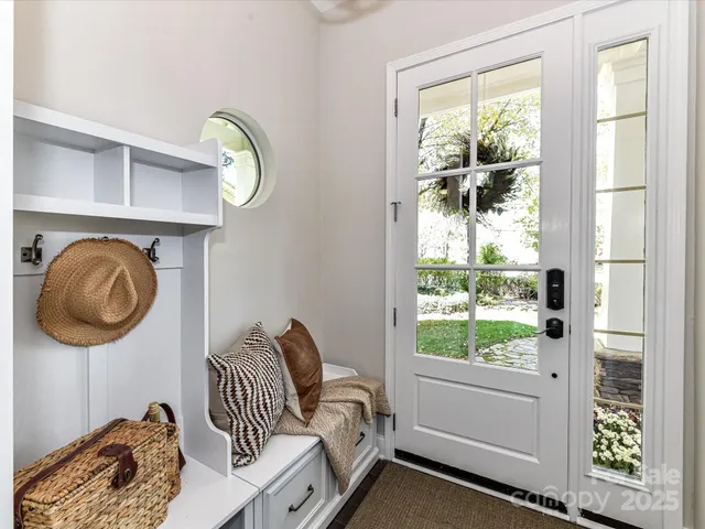 a bedroom with bed and a window