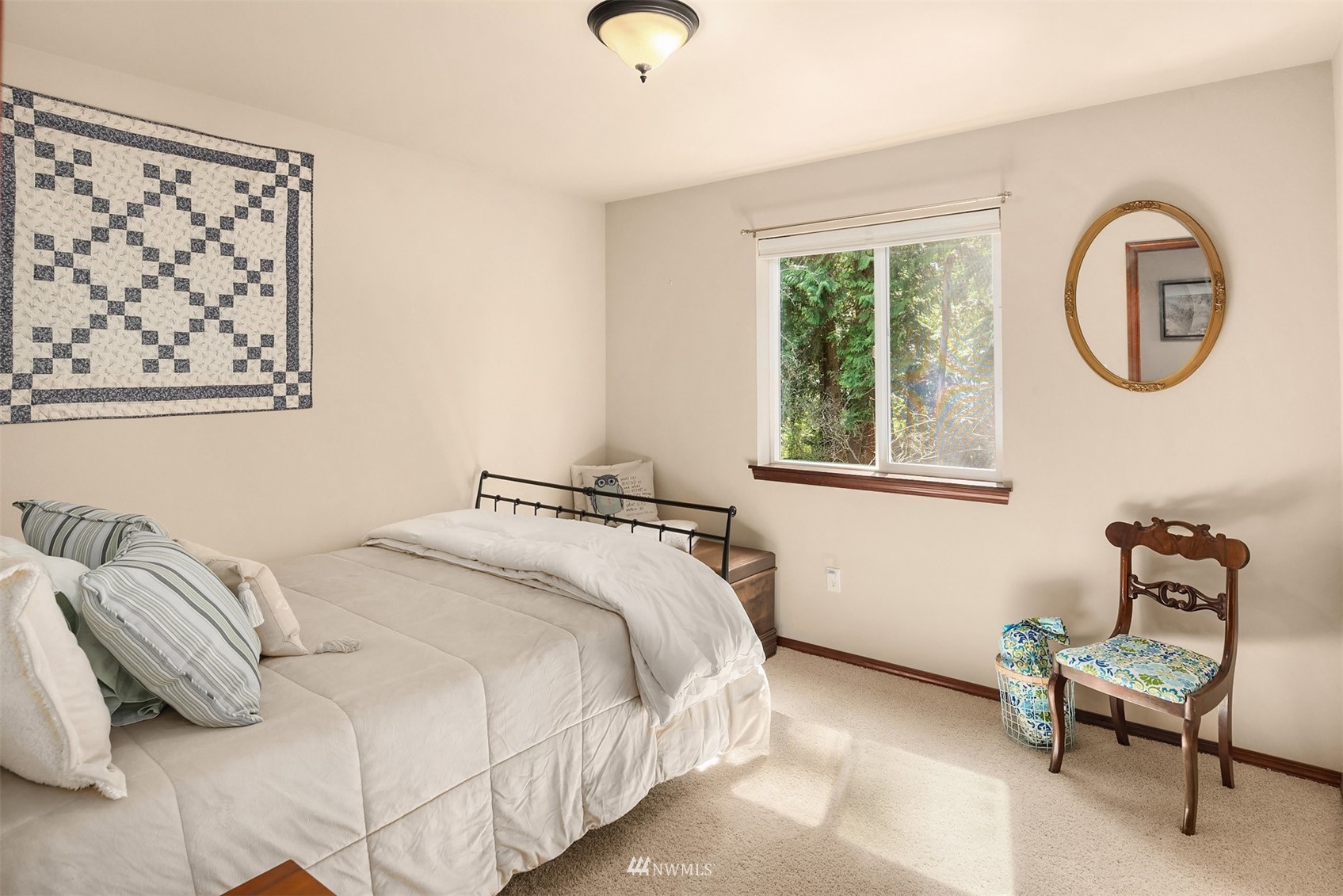 21614 11th Drive Southeast Bothell, WA 98021 - Photo 20 of 35 a bedroom with a bed and a window