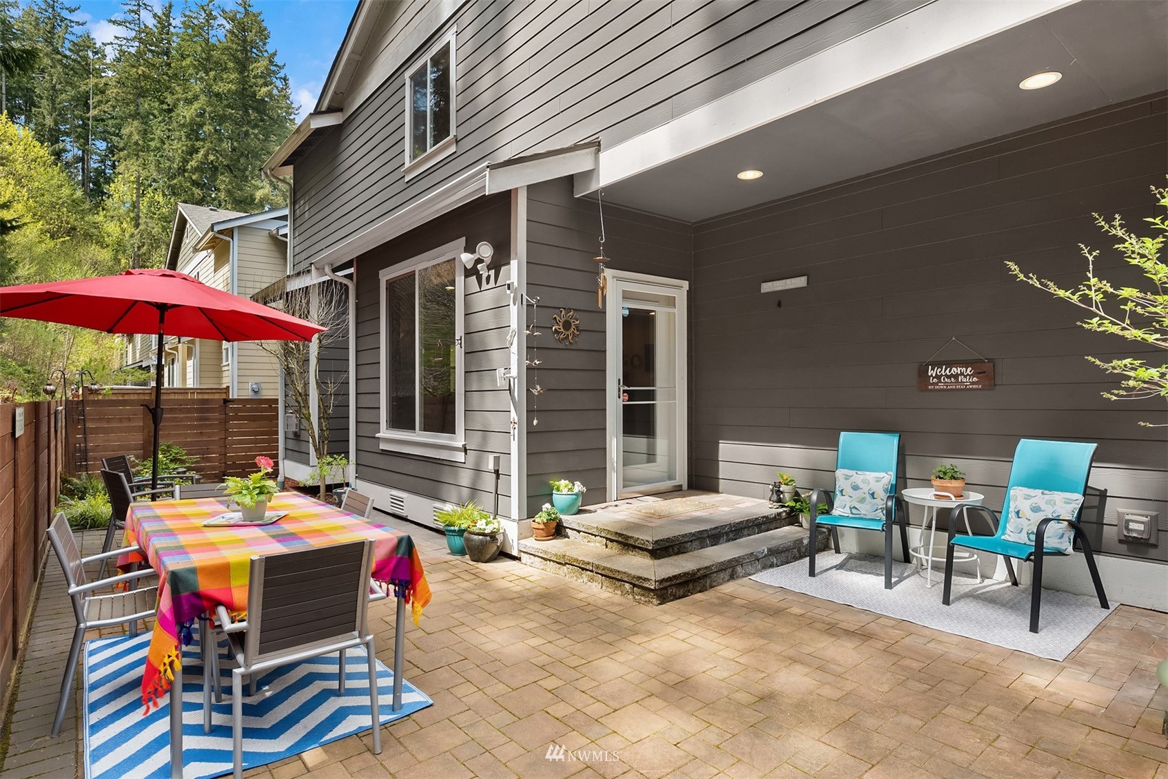 21614 11th Drive Southeast Bothell, WA 98021 - Photo 24 of 35 a backyard view of a house with porch and outdoor seating
