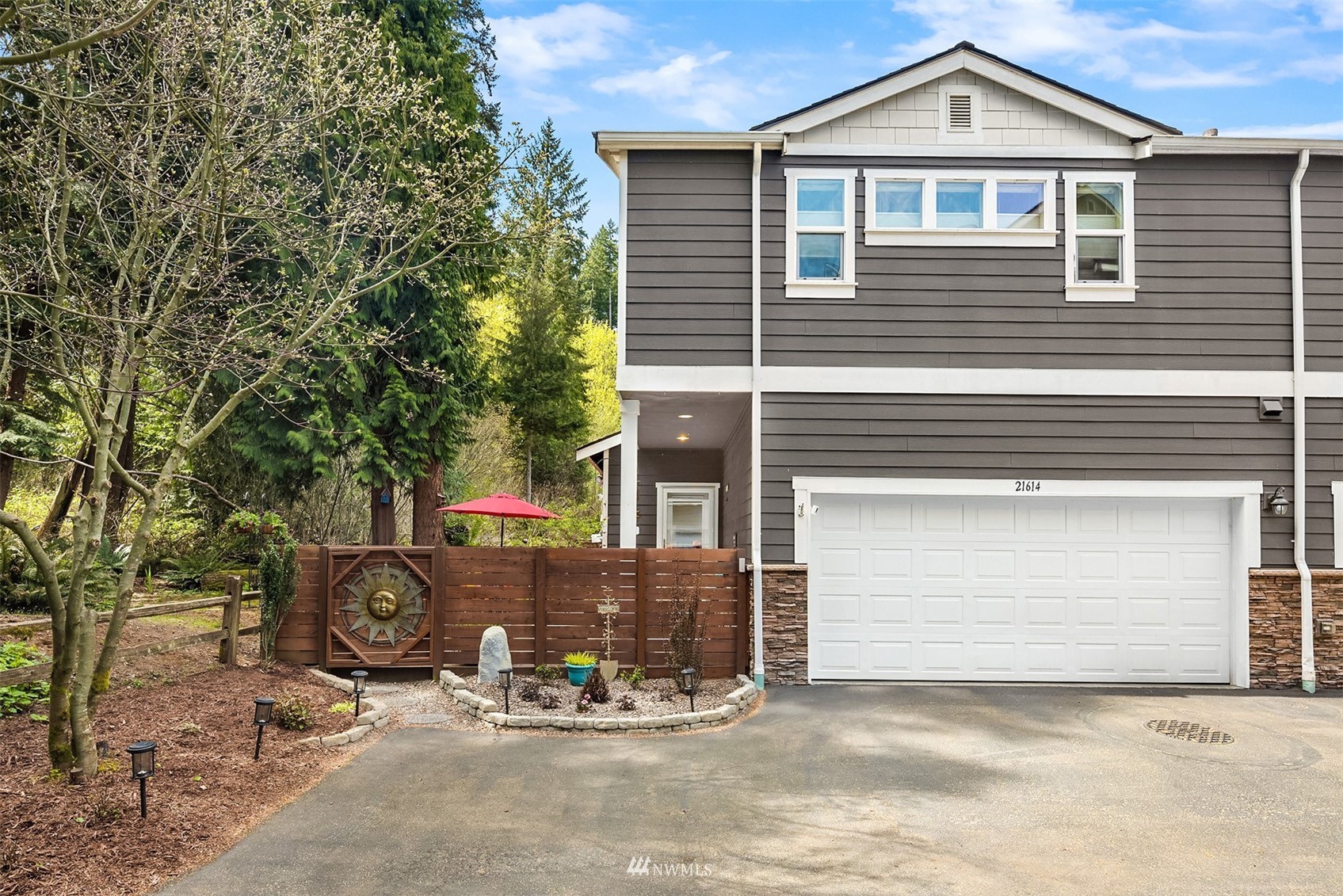 21614 11th Drive Southeast Bothell, WA 98021 - Photo 26 of 35 a front view of a house with garden