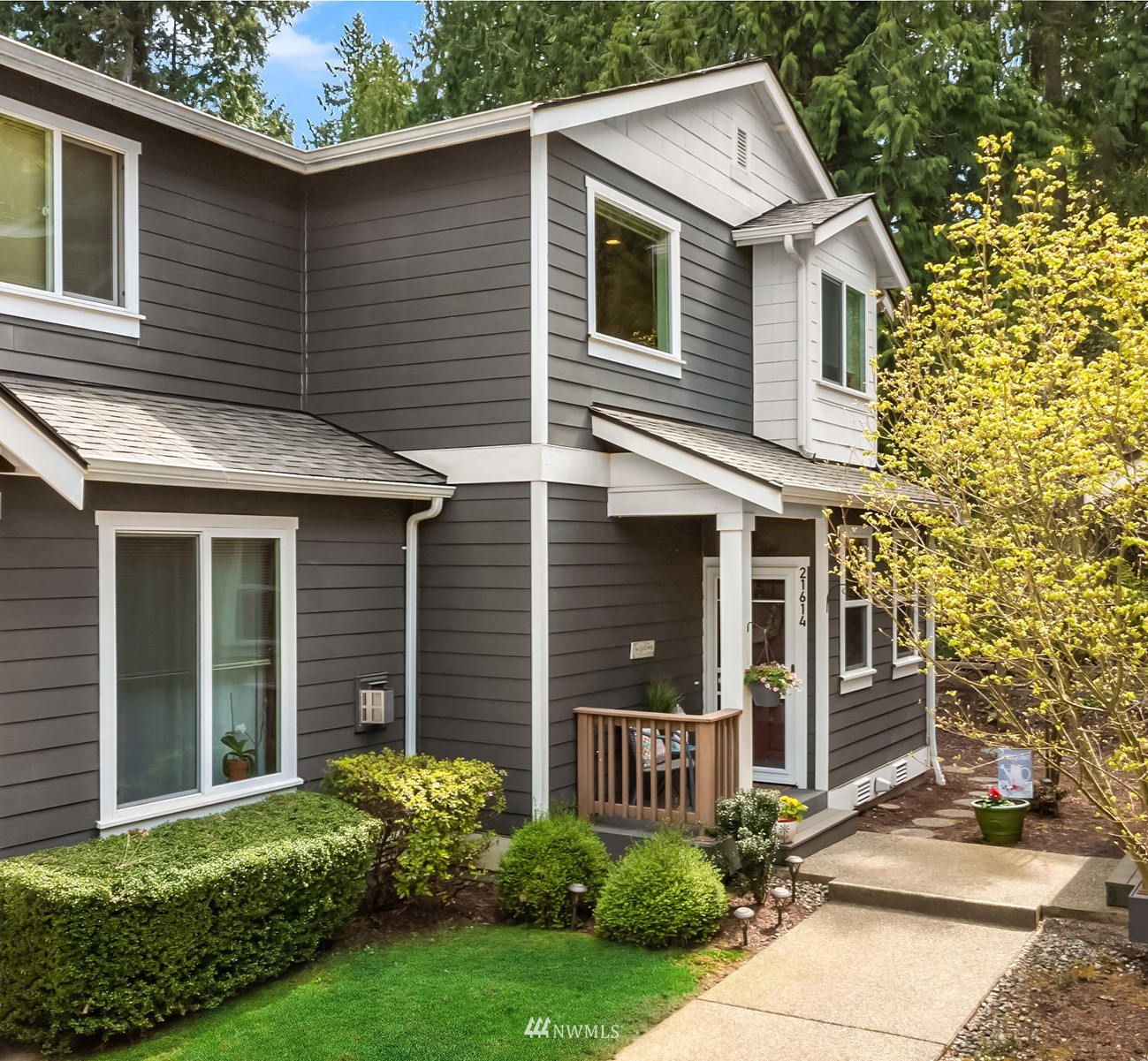 21614 11th Drive Southeast Bothell, WA 98021 - Photo 33 of 35 a front view of a house with garden