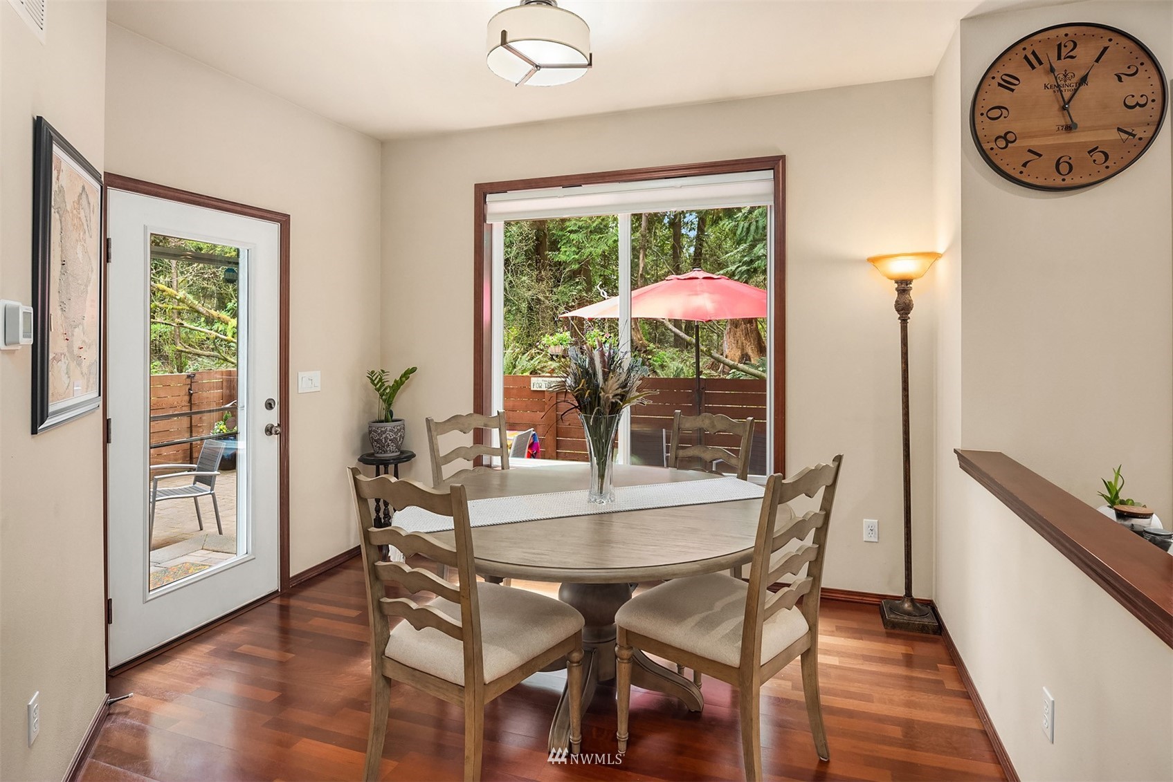 21614 11th Drive Southeast Bothell, WA 98021 - Photo 9 of 35 a view of a dining room with furniture window and wooden floor