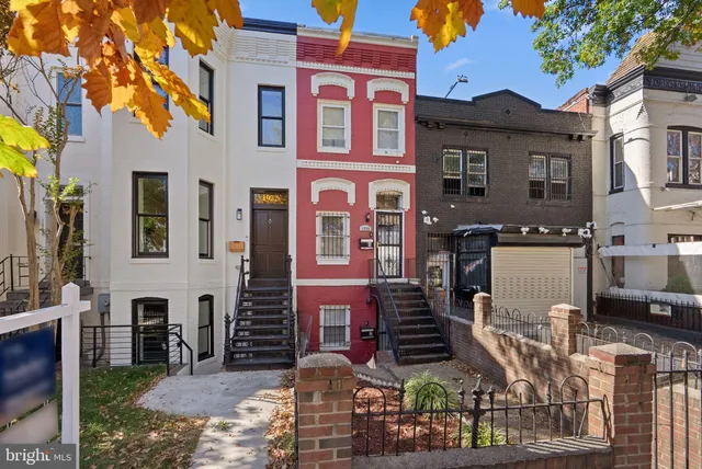 a front view of a building with glass windows