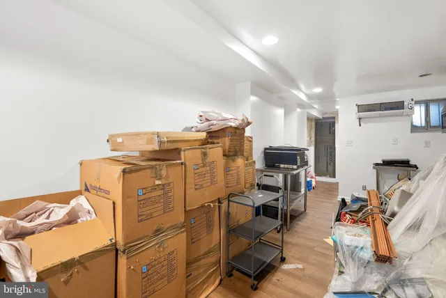 a view of a room with workspace and mirror