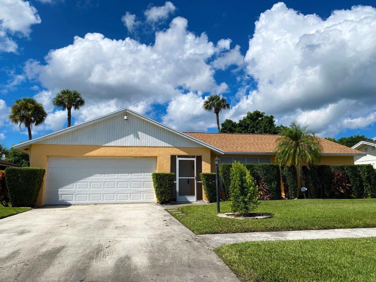 109 Timber Run East Riviera Beach, FL 33407 - Photo 1 of 15 Front