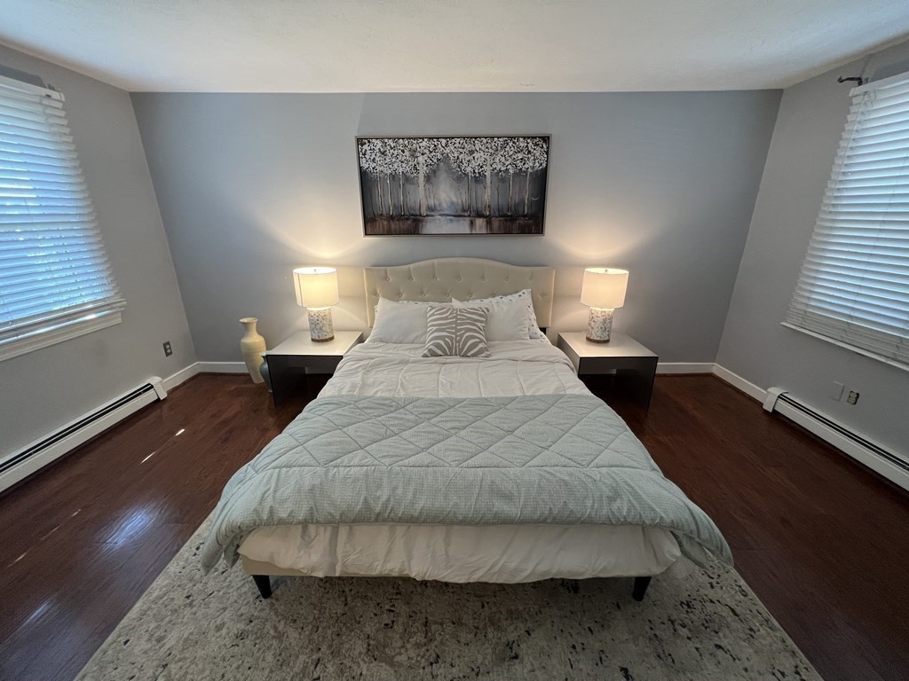 12 State Road, Unit 2E Plymouth, MA 02360 - Photo 9 of 28 a bedroom with a bed and window