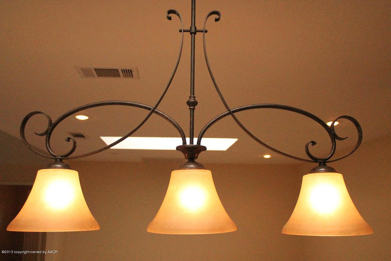 7002 Learning Tree Avenue Amarillo, TX 79119 - Photo 12 of 26 Light over bar area