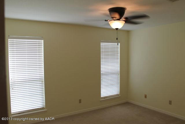 7002 Learning Tree Avenue Amarillo, TX 79119 - Photo 17 of 26 Bedroom Three