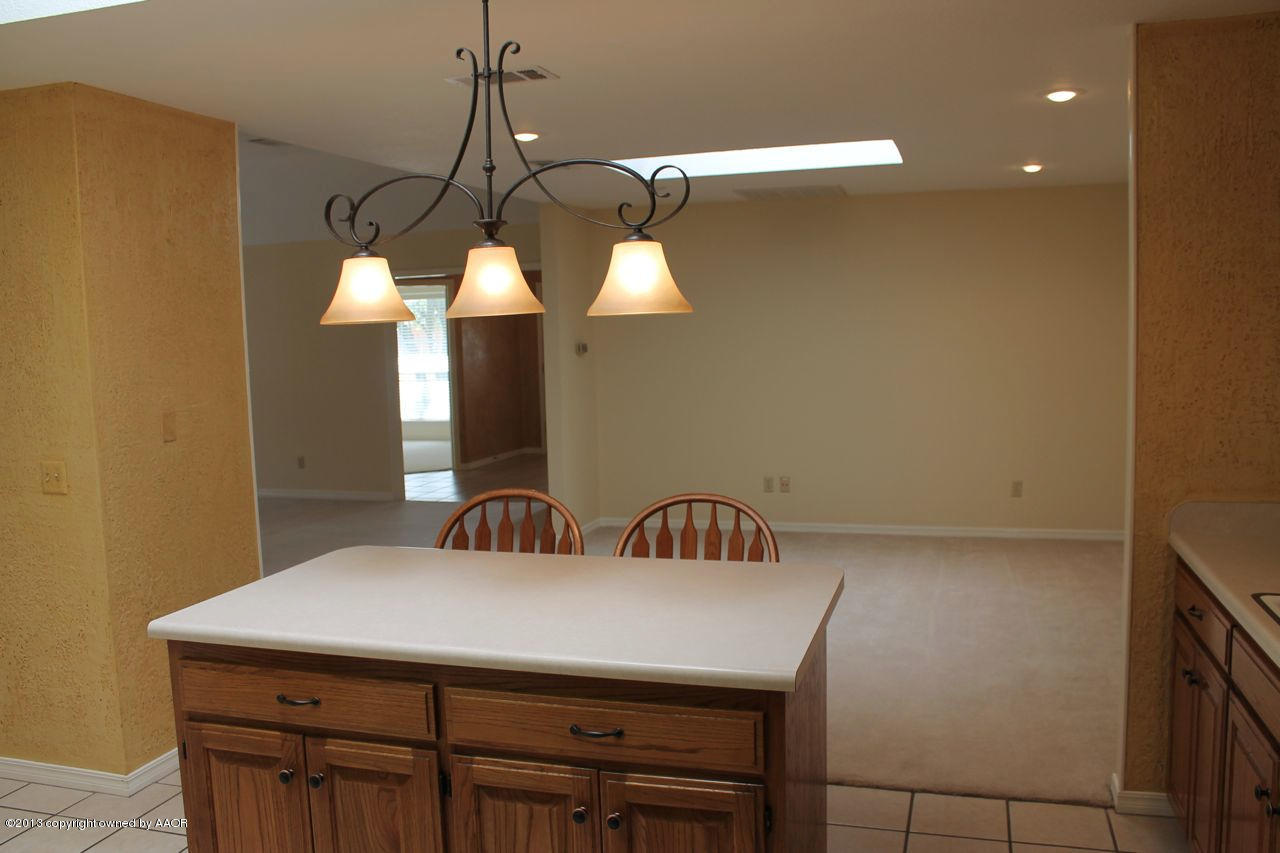 7002 Learning Tree Avenue Amarillo, TX 79119 - Photo 9 of 26 Kitchen to dining Living Area