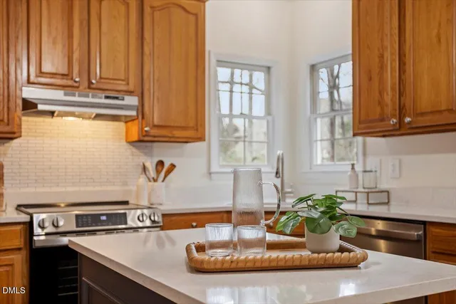a view of a balcony with potted plants