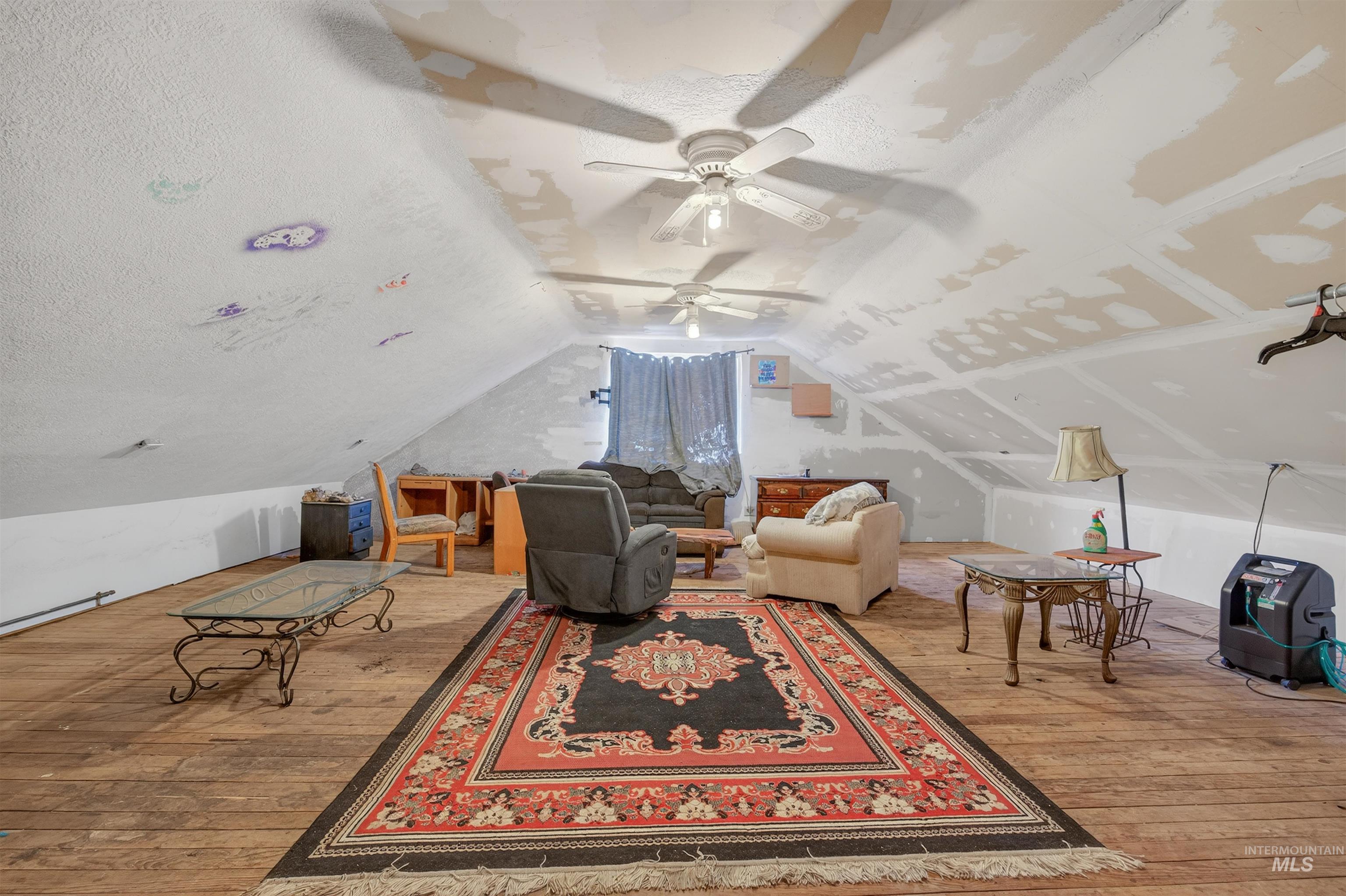 307 Esther Street Kooskia, ID 83539 - Photo 21 of 37 Sitting room with light wood-style flooring and lofted ceiling