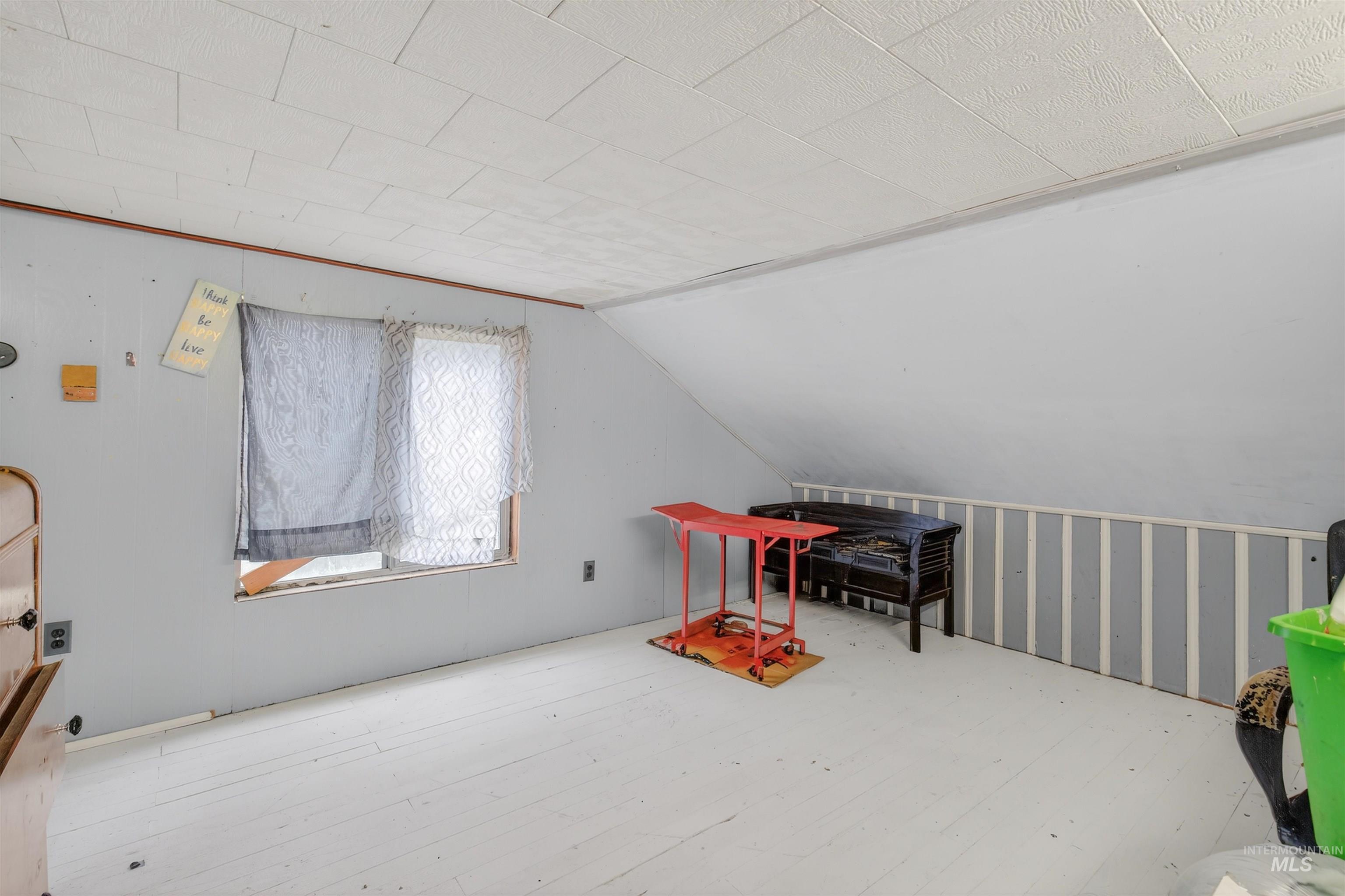 307 Esther Street Kooskia, ID 83539 - Photo 22 of 37 Playroom with vaulted ceiling and hardwood / wood-style flooring