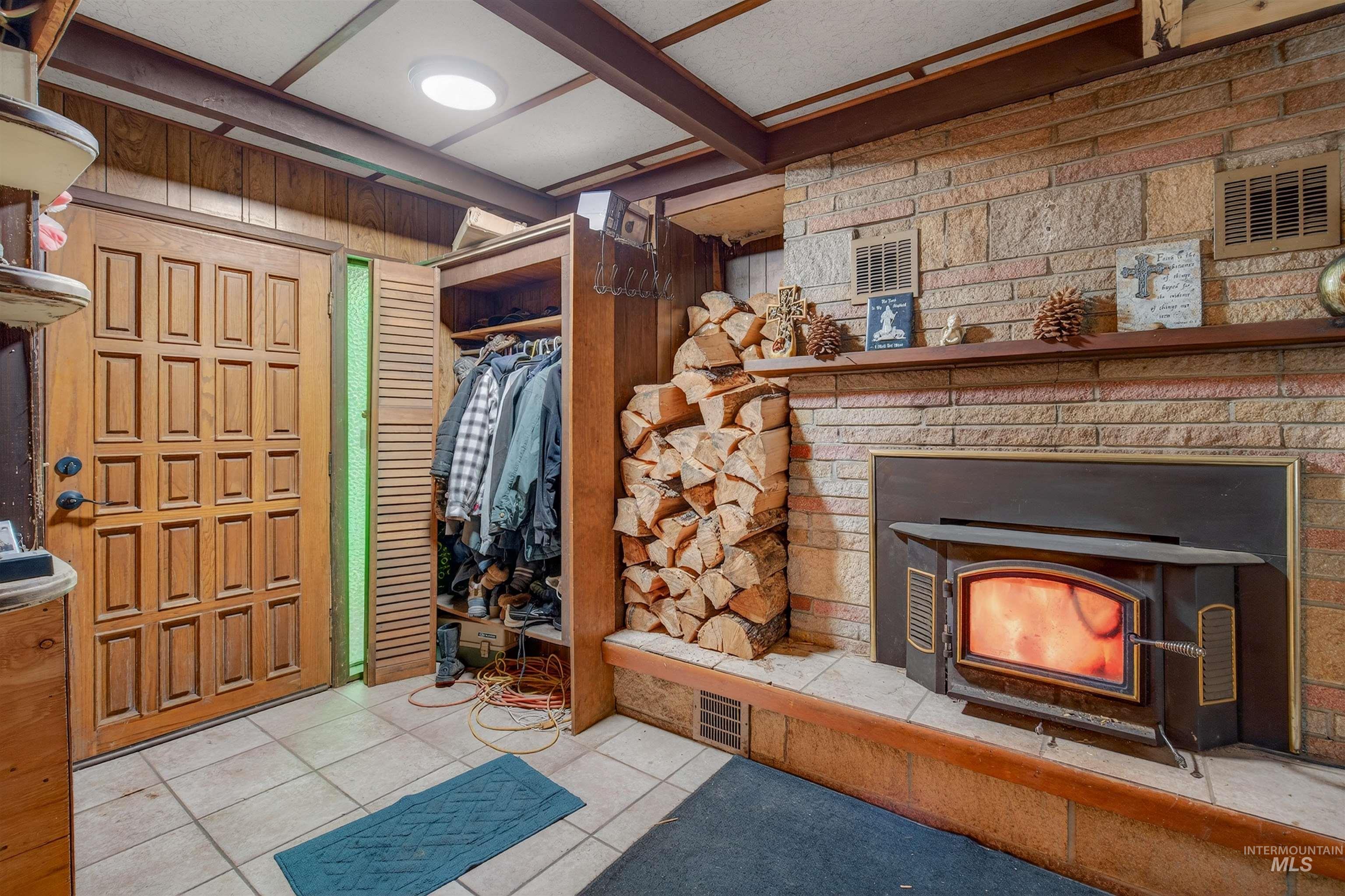 307 Esther Street Kooskia, ID 83539 - Photo 3 of 37 Tiled entrance foyer featuring wooden walls