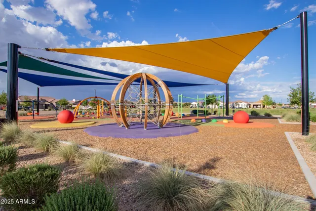 a view of a swimming pool with an outdoor seating and house