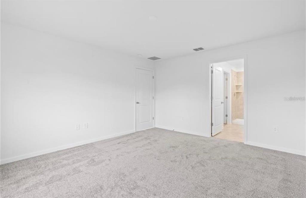 352 Heroic Road Davenport, FL 33837 - Photo 15 of 19 a view of an empty room