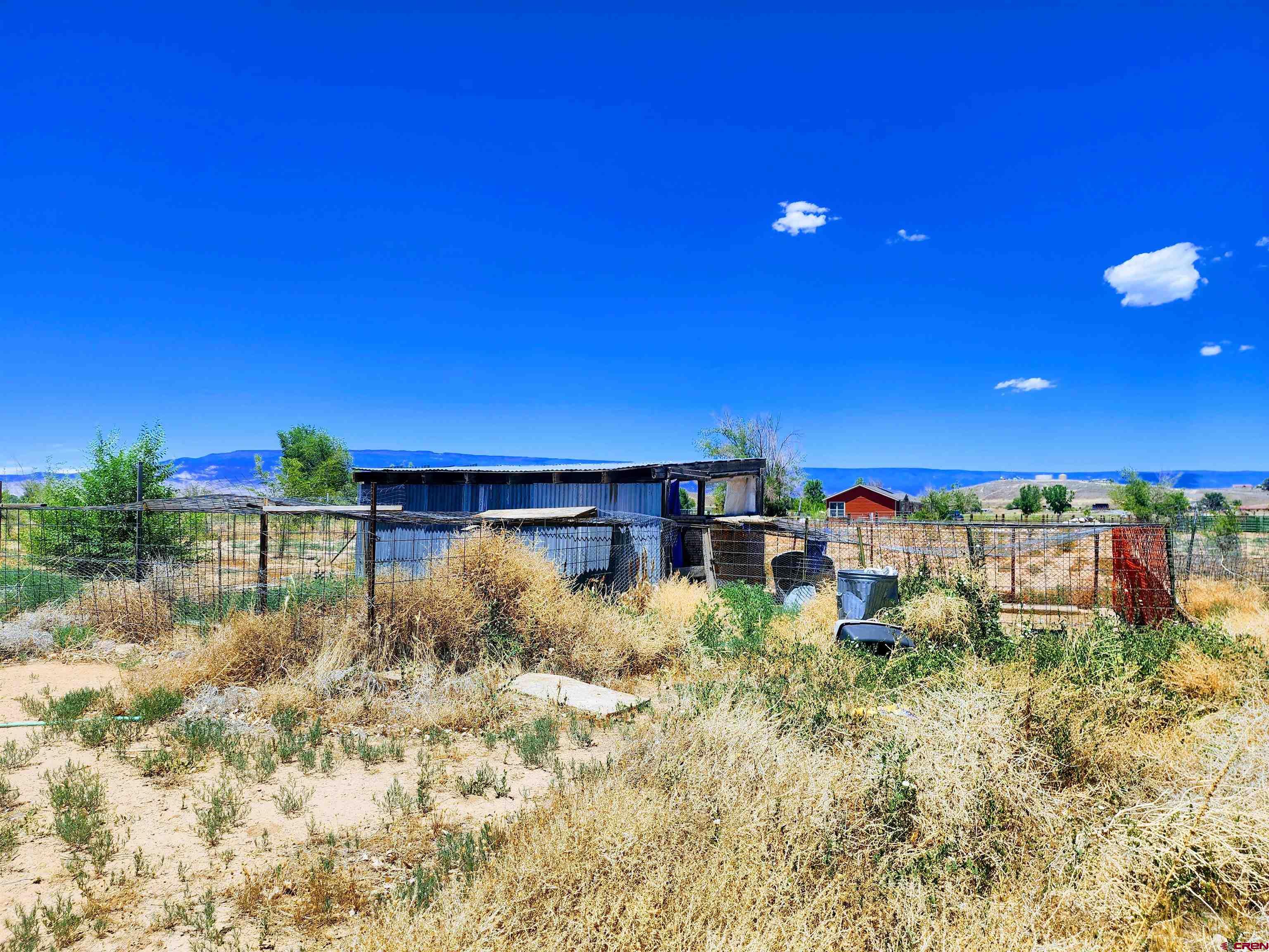 20897 Iris Road Austin, CO 81410 - Photo 28 of 29 a view of a houses with sky view