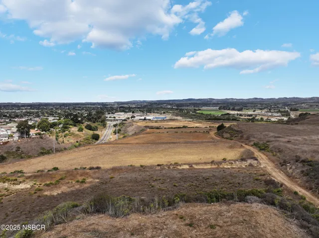 a view of a lake with a beach