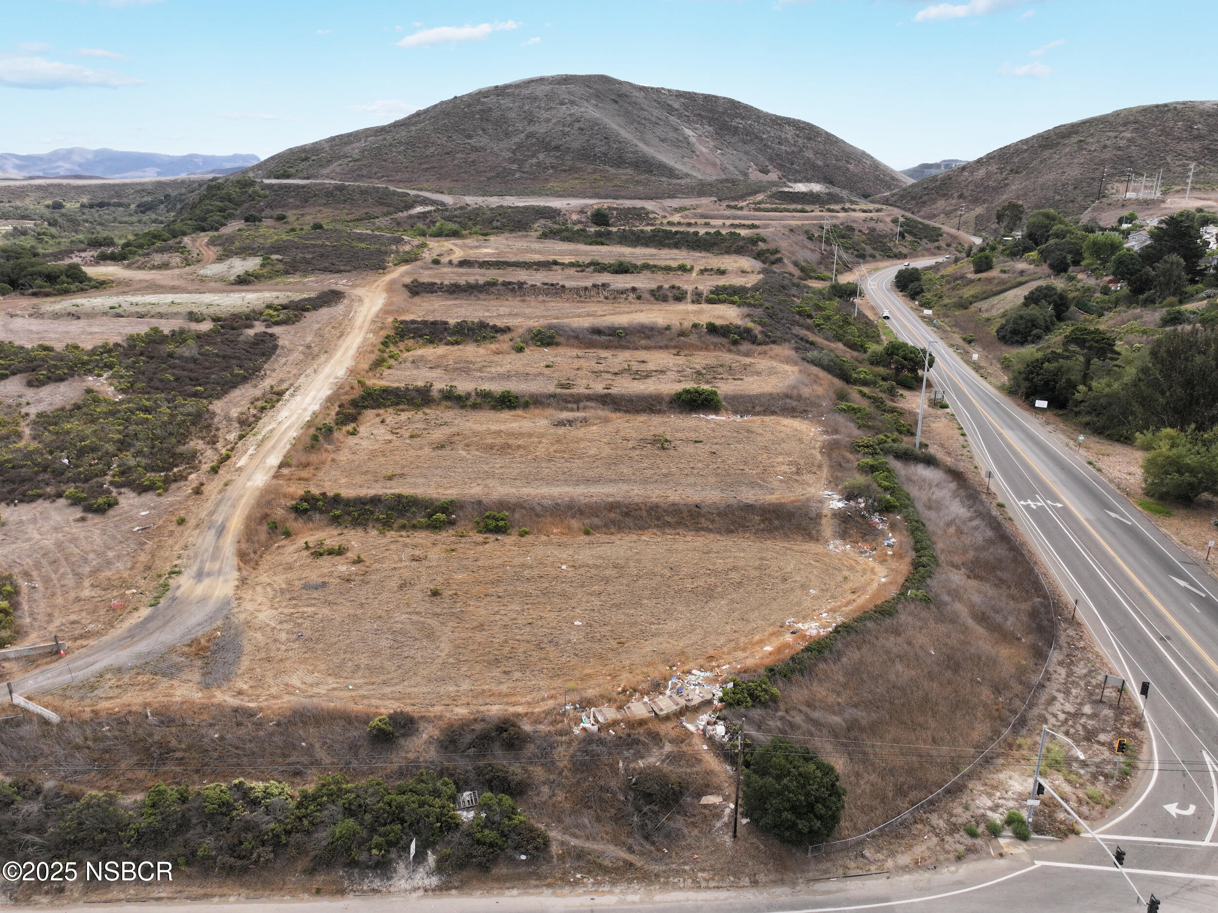 100 Highway 1 Lompoc, CA 93436 - Photo 8 of 37 a view of a dry yard with mountain