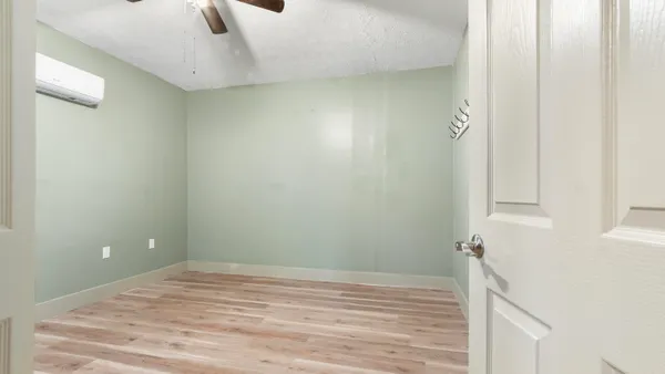 a view of a closet in a room
