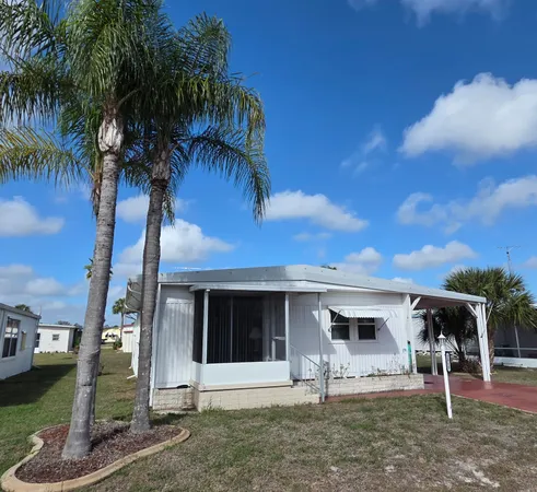 a view of a house with a patio