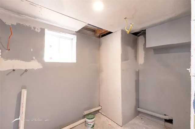 an empty room with a workbench