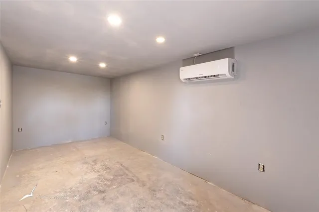 a view of hallway with bathroom