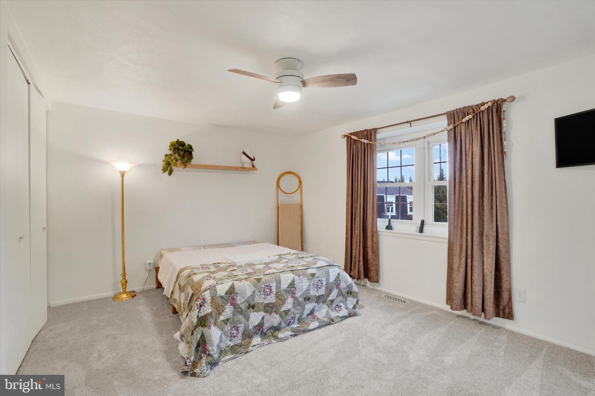 685 Colony Drive York, PA 17404 - Photo 18 of 26 a bedroom with a bed and a cabinets