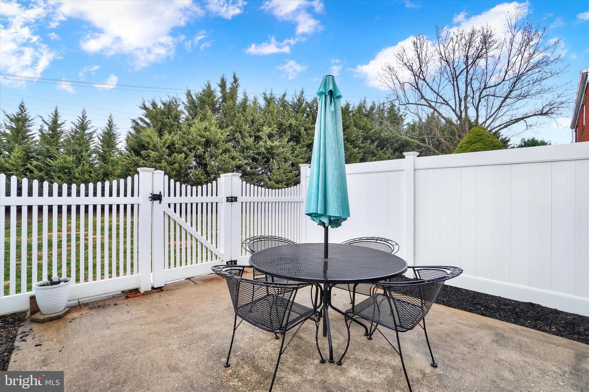 685 Colony Drive York, PA 17404 - Photo 20 of 26 a view of a table and chairs in the patio