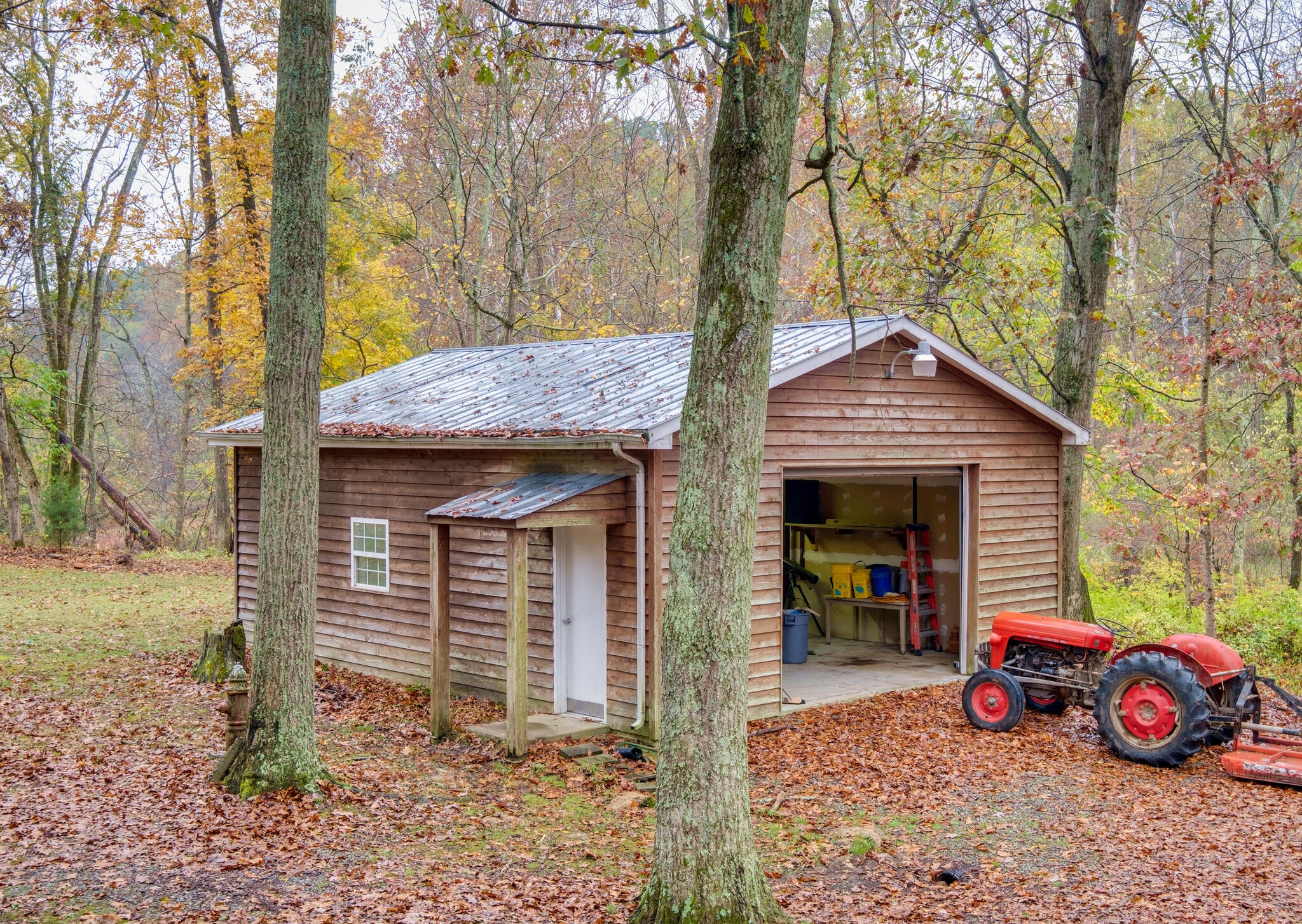 2858 Distillery Road Greenbrier, TN 37073 - Photo 22 of 28 a front view of a house with parking space
