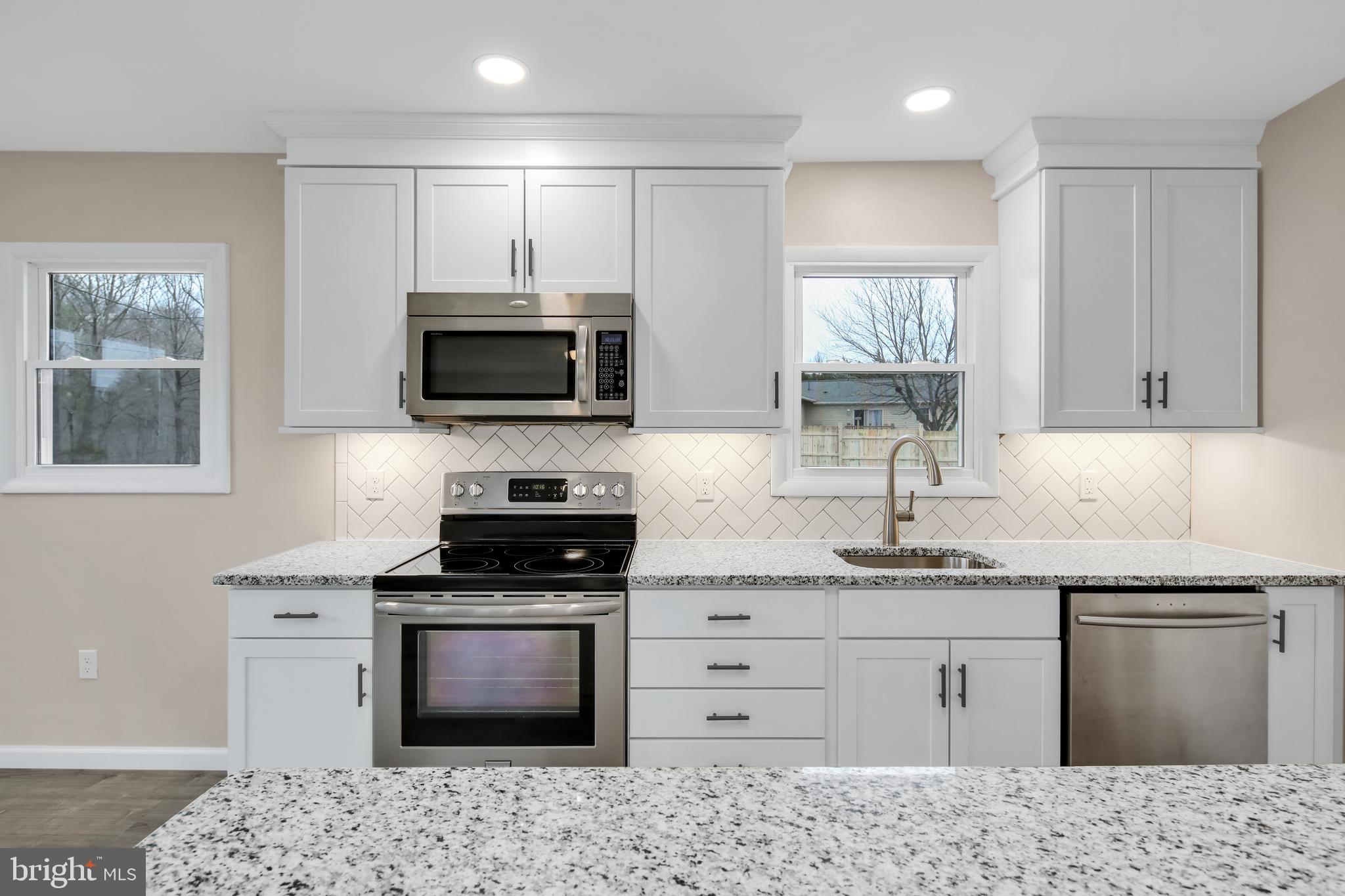 3406 Howellsville Road Front Royal, VA 22630 - Photo 10 of 29 White cabinets with under the cabinet lighting