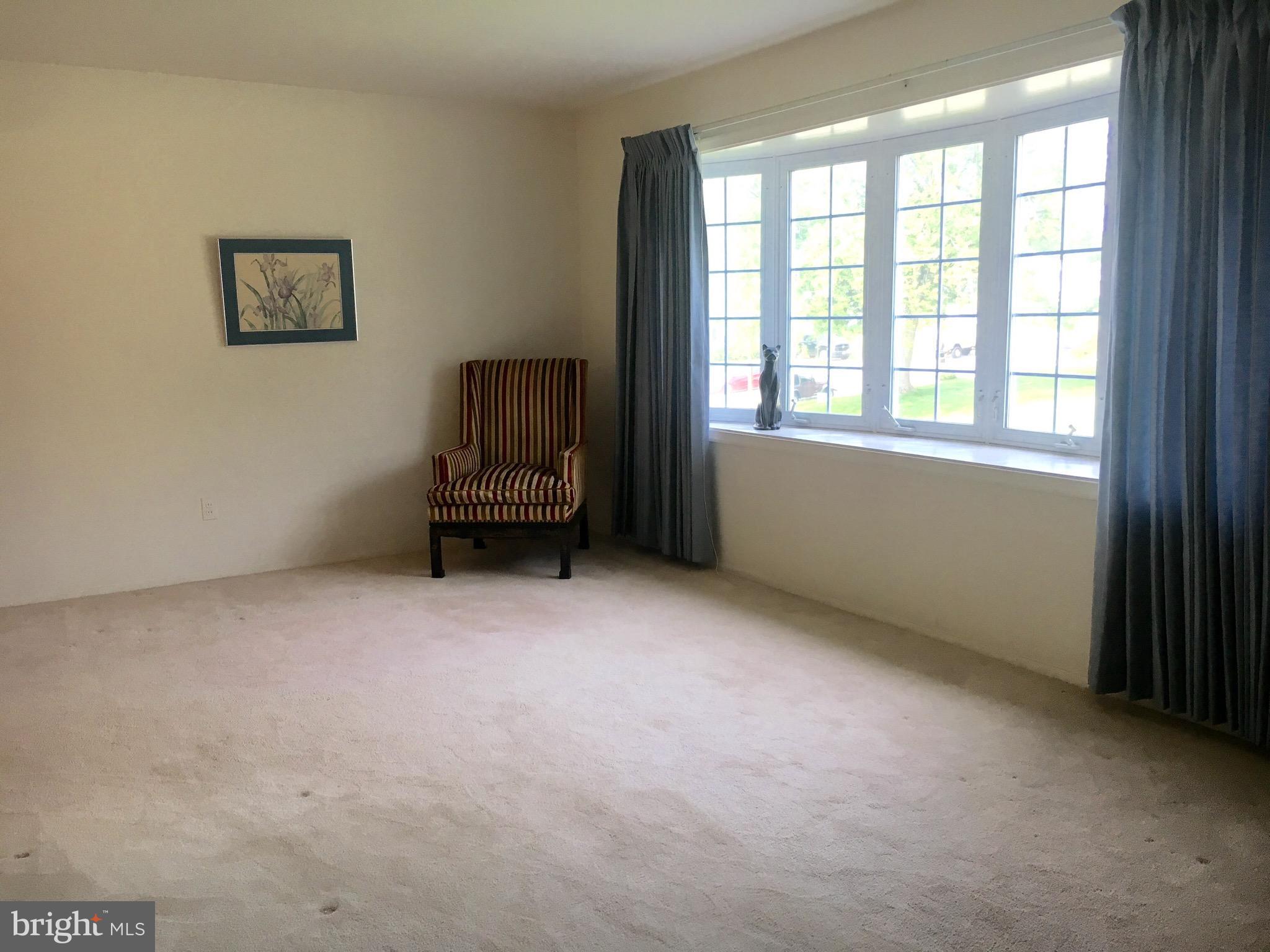 9003 Tammy Road Baltimore, MD 21236 - Photo 3 of 12 a view of an empty room with a window