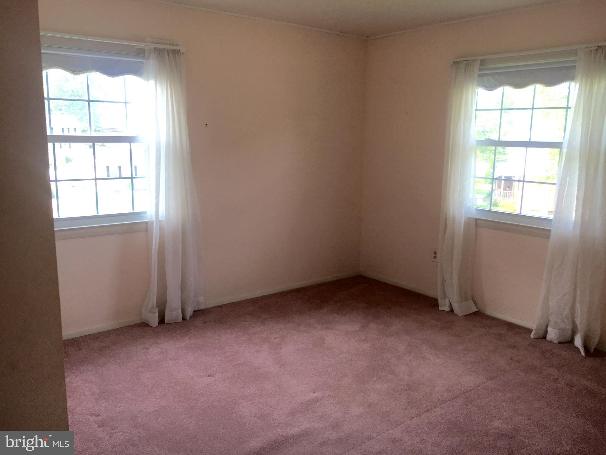 9003 Tammy Road Baltimore, MD 21236 - Photo 10 of 12 an empty room with a window