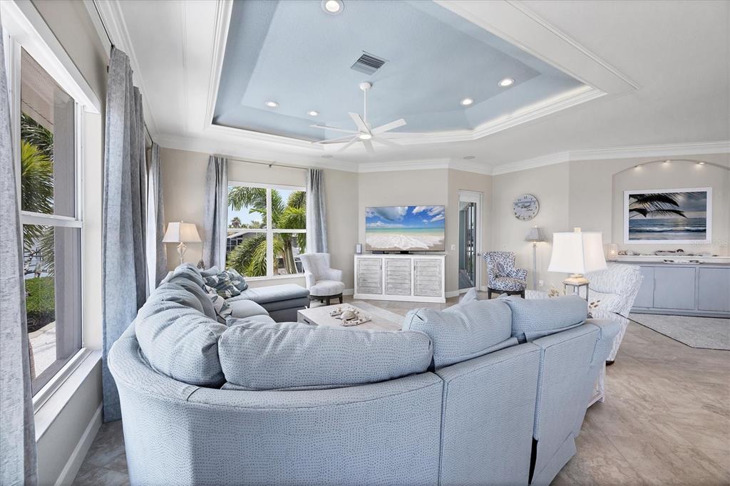 4111 North Beach Road Englewood, FL 34223 - Photo 19 of 87 a living room with furniture and a large window