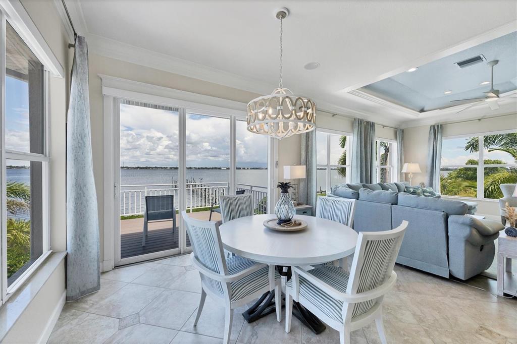 4111 North Beach Road Englewood, FL 34223 - Photo 29 of 87 a view of a dining room with furniture window and outside view