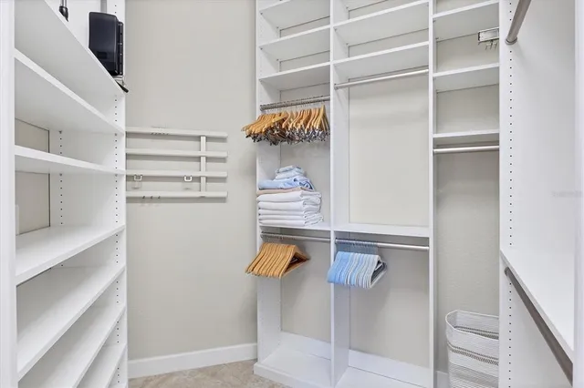 a view of a lake with houses in the back