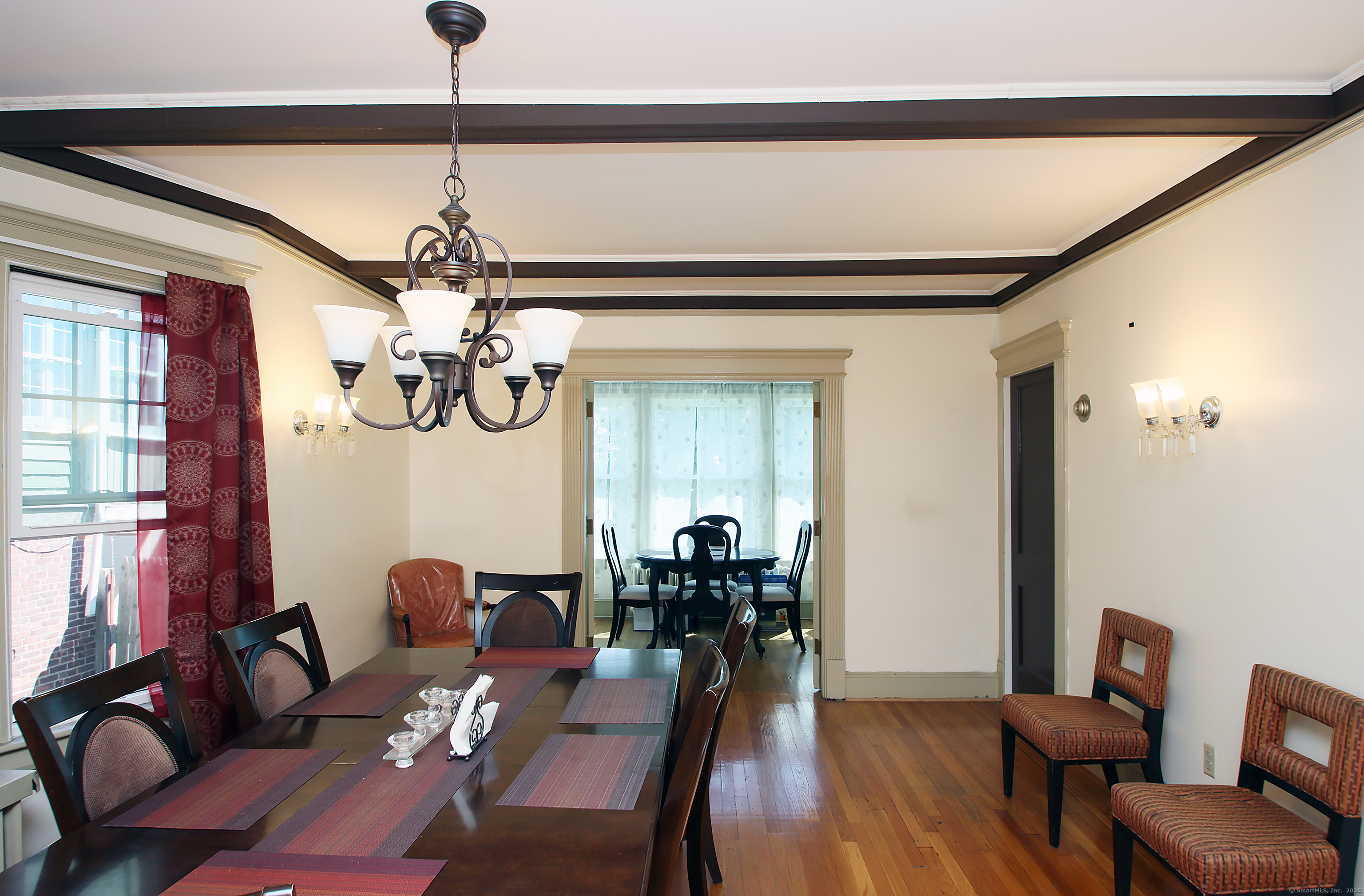 181 Buckingham Street Waterbury, CT 06710 - Photo 11 of 40 a view of a livingroom with furniture window and wooden floor