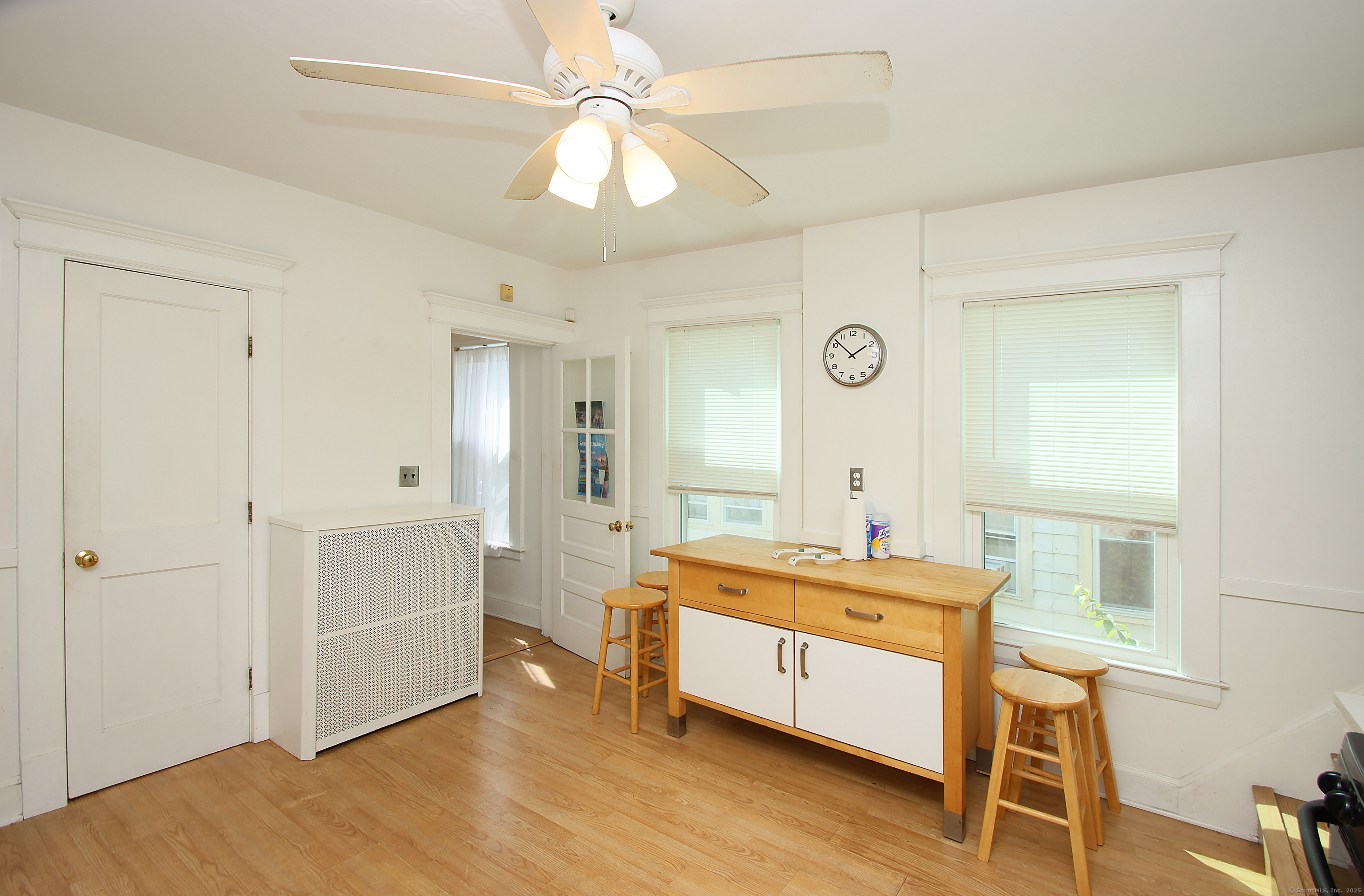 181 Buckingham Street Waterbury, CT 06710 - Photo 16 of 40 a room with a bed and a table in it