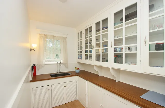 a kitchen with a sink and a window