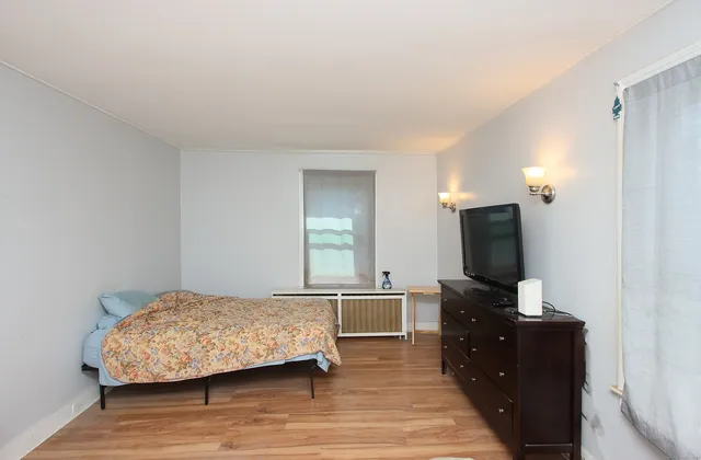 a bathroom with a sink toilet and vanity