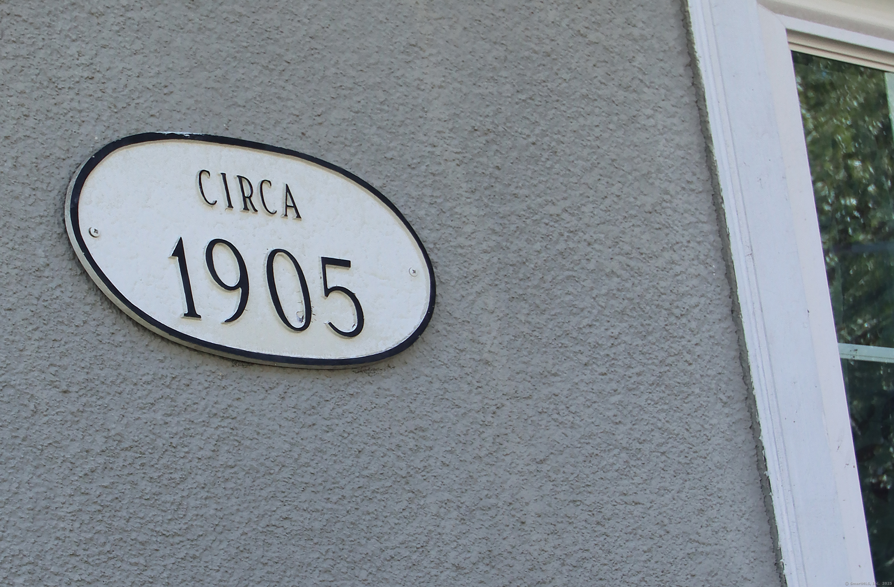 181 Buckingham Street Waterbury, CT 06710 - Photo 3 of 40 a view of a hallway with a wall