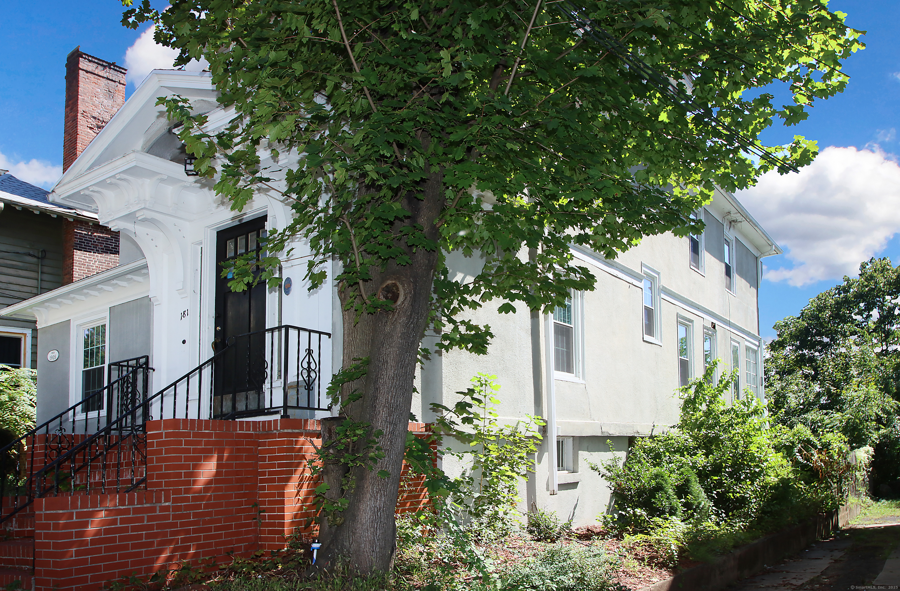181 Buckingham Street Waterbury, CT 06710 - Photo 40 of 40 a view of a yard in front of a house