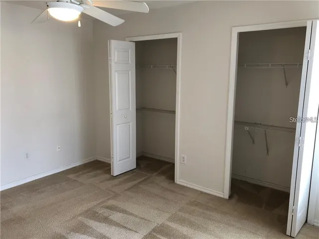 an empty room with a bathroom