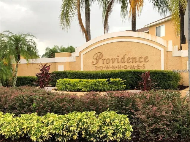 a view of a garden with potted plants