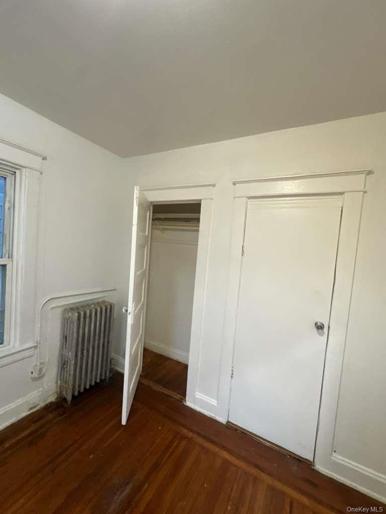 3581 Eastchester Road, Unit 2 Bronx, NY 10469 - Photo 3 of 13 a view of front door with wooden floor