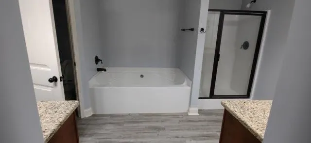 a white bath tub sitting in a bathroom