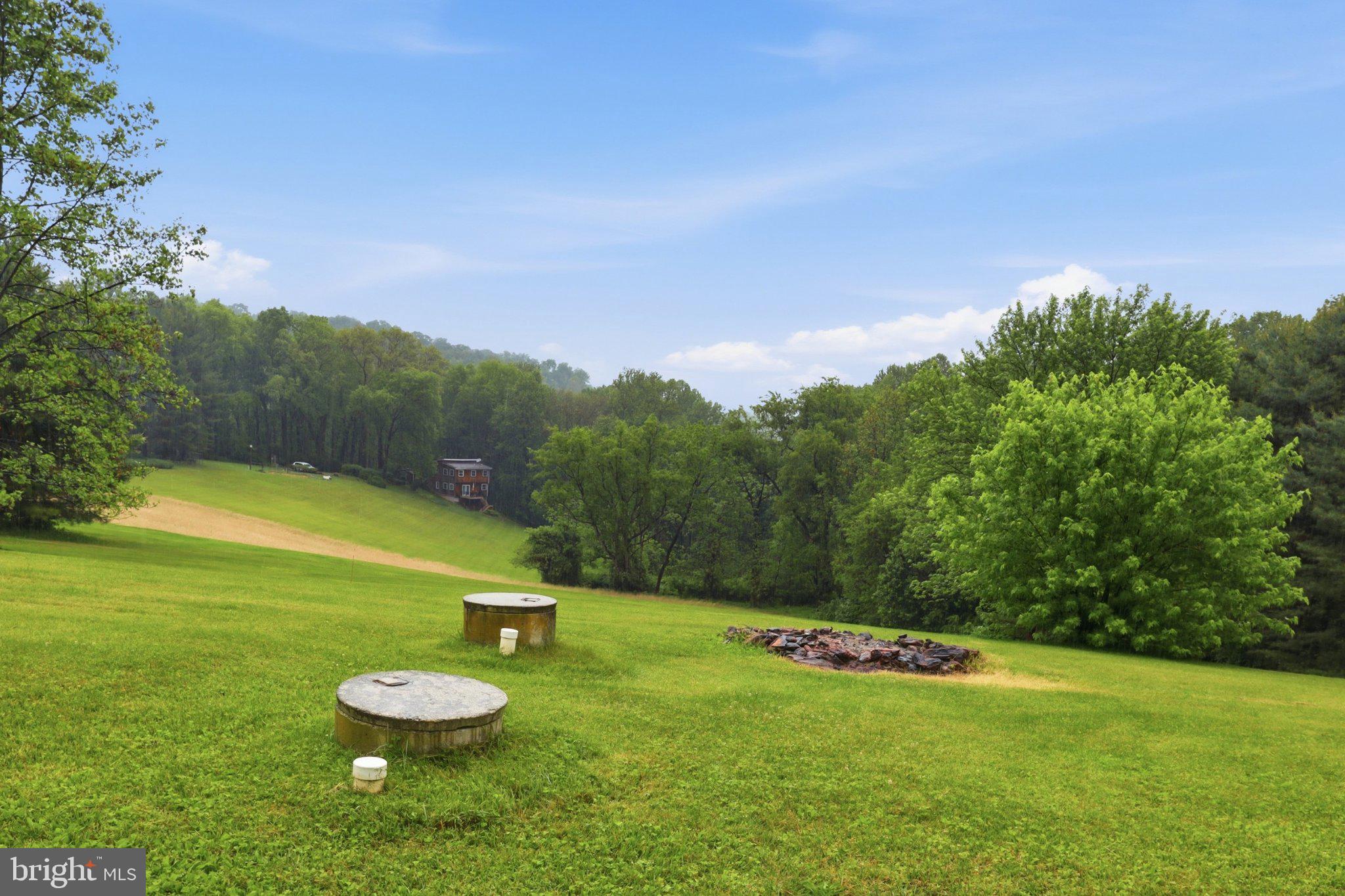 491 Garvine Mill Road Fawn Grove, PA 17321 - Photo 32 of 47 a view of a swimming pool with a yard